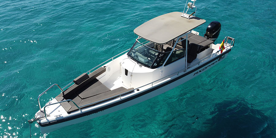 Axopar boat hire cruising on the water in Mallorca with Vibe Mallorca